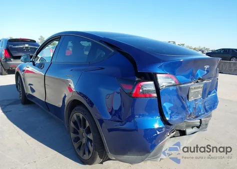 2022 Tesla Model Y Long Range Dual Motor All-Wheel Drive z USA, uszkodzony, nr VIN 7SAYGDEE4NF313705